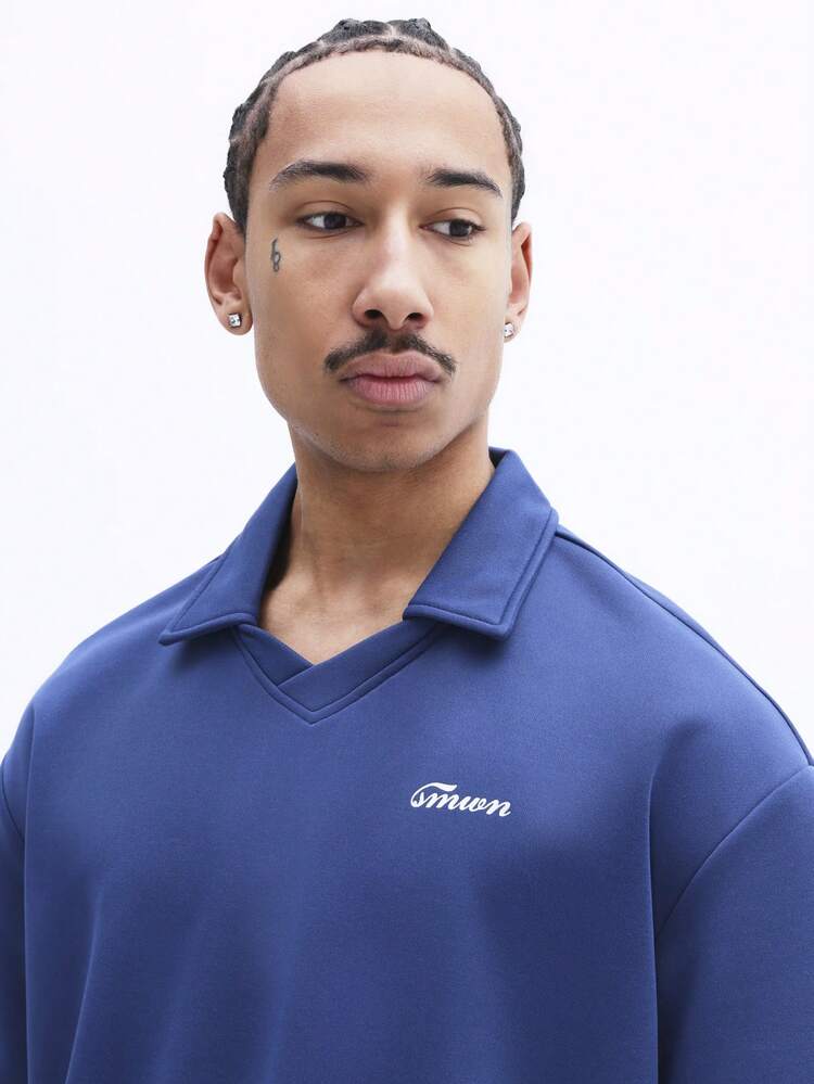 Polo a maniche corte con logo in corsivo