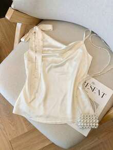 GlowEve 女士纯色缎面吊带背心，肩带可调节，蝴蝶结装饰，垂褶领口，收腰设计，杏色，优雅复古法式风格，适合办公室、通勤、商务、休闲、海滩、日常穿着、婚礼、派对、春夏等场合。 - 杏色 - 查看 6