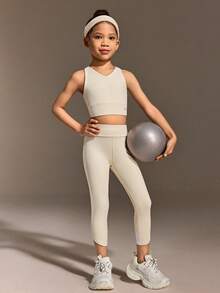 SHEIN Young Girls Clothing Fashion Set Features A Sleeveless Vest With A Cross-Cut Back Design And Tight Capri Pants, Making It Suitable For Daily Casual Outings And All-Season Wear - Apricot - View 7