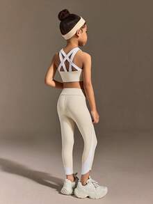 SHEIN Young Girls Clothing Fashion Set Features A Sleeveless Vest With A Cross-Cut Back Design And Tight Capri Pants, Making It Suitable For Daily Casual Outings And All-Season Wear - Apricot - View 1