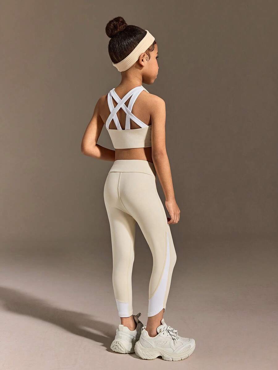 SHEIN Young Girls Clothing Fashion Set Features A Sleeveless Vest With A Cross-Cut Back Design And Tight Capri Pants, Making It Suitable For Daily Casual Outings And All-Season Wear - Apricot - View 1
