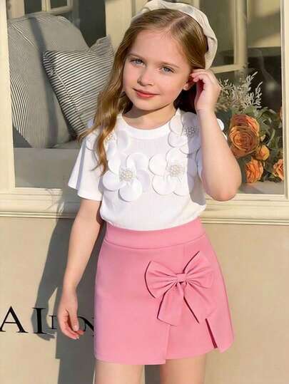 Conjunto de camiseta de manga corta de punto blanco con cuello redondo y decoración floral, y falda rosa para niñas (talla pequeña), conjunto de ropa casual de verano dulce para niña