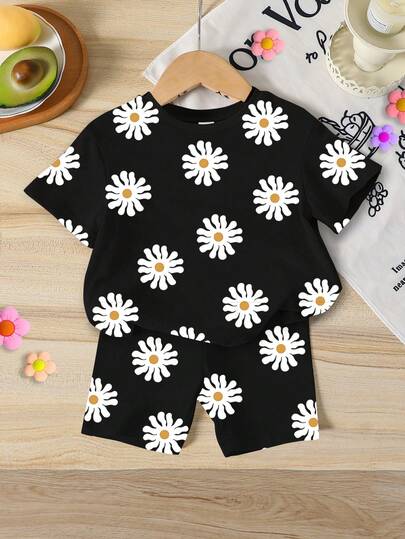 SHEIN 2 piezas Conjunto de camiseta de manga corta con cuello redondo y estampado de margaritas y shorts ajustados de punto para niñas, estilo casual y dulce para vacaciones. Conjunto de camiseta cómoda para niñas, atuendo diario de verano