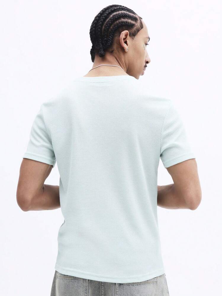 Geripptes Strick-T-Shirt mit Rundhalsausschnitt
