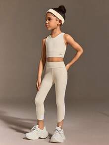 SHEIN Young Girls Clothing Fashion Set Features A Sleeveless Vest With A Cross-Cut Back Design And Tight Capri Pants, Making It Suitable For Daily Casual Outings And All-Season Wear - Apricot - View 2