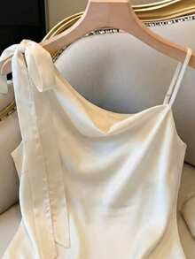 GlowEve 女士纯色缎面吊带背心，肩带可调节，蝴蝶结装饰，垂褶领口，收腰设计，杏色，优雅复古法式风格，适合办公室、通勤、商务、休闲、海滩、日常穿着、婚礼、派对、春夏等场合。 - 杏色 - 查看 4