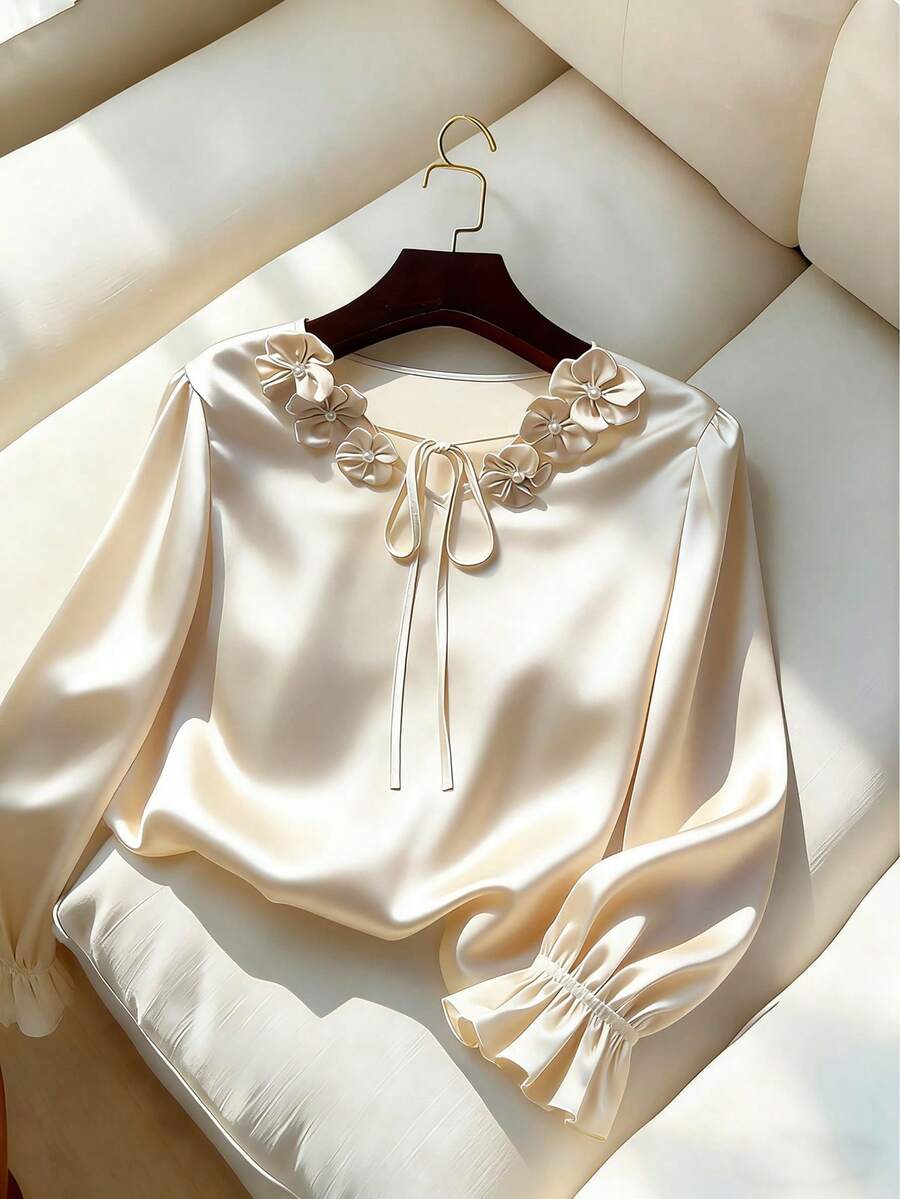 Chiquease 优雅V领长袖衬衫，配花卉领结，缎面面料，杏色，适合秋冬季节和正式场合。 - 杏色 - 查看 1