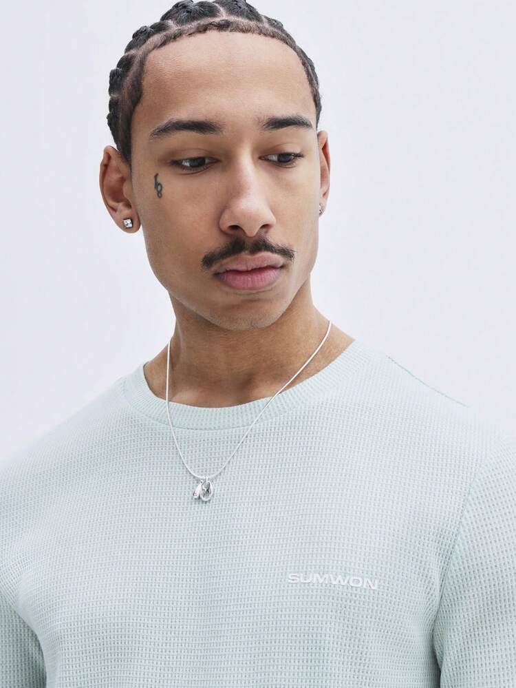 Geripptes Strick-T-Shirt mit Rundhalsausschnitt