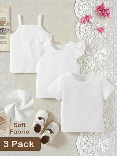 SHEIN 3件套女婴白色套装，包括吊带背心、短袖上衣和短袖连衣裙，适合居家和户外穿着，是夏季休闲百搭之选。