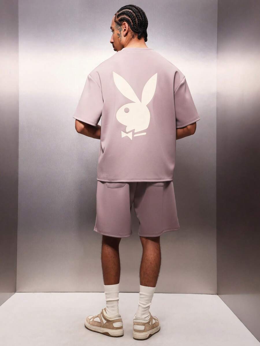 PLAYBOY X SUMWON Bộ đồ Essentials gồm áo thun cổ tròn dáng rộng và quần short cùng màu, in logo thỏ ở lưng, tay ngắn, kiểu dáng thoải mái, thích hợp mặc nhà vào mùa hè. Chất liệu vải phối hợp hài hòa. - Bụi tím - Xem 1