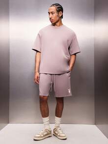 PLAYBOY X SUMWON Bộ đồ Essentials gồm áo thun cổ tròn dáng rộng và quần short cùng màu, in logo thỏ ở lưng, tay ngắn, kiểu dáng thoải mái, thích hợp mặc nhà vào mùa hè. Chất liệu vải phối hợp hài hòa. - Bụi tím - Xem 8
