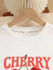 Elladie kids 两件套：少女格子图案梭织半身裙搭配蝴蝶装饰针织T恤，可爱校园/日常穿搭；两件套：女童蝴蝶装饰百褶裙搭配樱桃格子印花短袖短裤，舒适户外/校园穿搭 - 紅色 - 查看 6