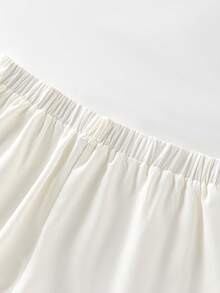 GlowEve CURVE Quần short thời trang buộc dây phía trước dành cho nữ cỡ lớn, phù hợp để đi làm. - trắng - Xem 3