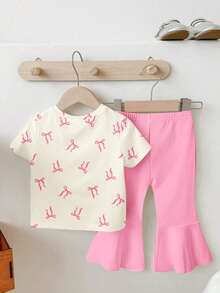 SHEIN 一套女婴休闲可爱蝴蝶结卡通猫印花圆领短袖T恤和喇叭裤套装，粉色 - 彩色 - 查看 2