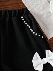 SHEIN Elladie kids 女童优雅可爱彼得潘领珍珠纽扣泡泡袖衬衫配蝴蝶结珍珠短裤套装 - 黑與白 - 查看 6