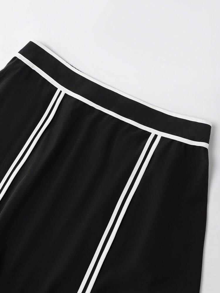 GlowEve CURVE Falda holgada de línea A con contraste de color negro y blanco para mujer de talla grande, cintura elástica, versátil para el trabajo y el uso diario - Blanco y Negro - Añade 4