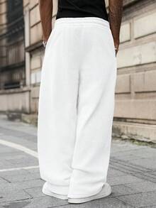 Manfinity EMRG 男士纯色抽绳腰带口袋休闲宽松运动裤灰色运动裤宽松运动裤灰色慢跑裤男士专业俱乐部运动裤长裤运动裤男士灰色宽松运动裤，宽松裤，运动裤，慢跑裤，宽松 - 白色 - 查看 2