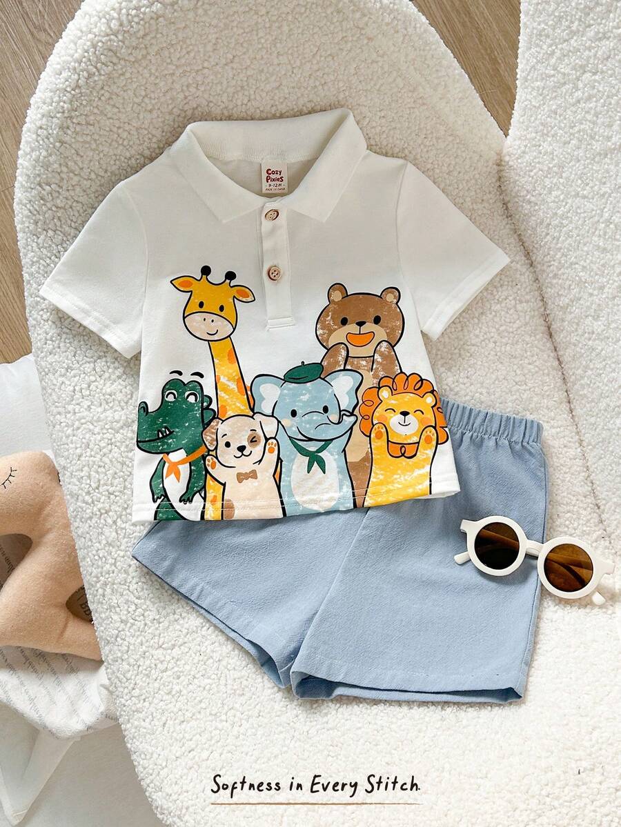 Cozy Pixies Bộ 2 món cho bé trai, gồm áo thun ngắn tay cổ bẻ mềm mại họa tiết khủng long hoạt hình và quần short cạp chun. - Màu xanh lam - Xem 1