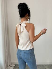 Elenzga Áo kiểu nữ thanh lịch, thường ngày, chất liệu satin trơn, cổ buộc dây, không tay, cổ xếp ly, vai trang trí kim loại, kiểu dáng tối giản, thích hợp cho hẹn hò, tiệc sinh nhật, đám cưới, các sự kiện tựu trường, thời trang nữ mới. - Màu be - Xem 2