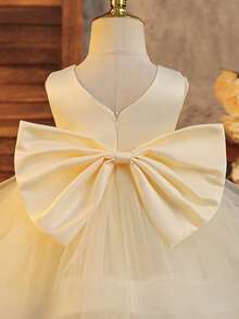 SHEIN Glamorique Kids 女婴杏色网纱蓬蓬裙，无袖方领，带大蝴蝶结装饰，适合派对穿着。休闲修身短款公主裙，杏色无袖蓬蓬裙，带蝴蝶结，适合花童跳舞，蝴蝶结，女婴杏色裙摆，双层网纱连衣裙，白色珍珠使人自信骄傲，连衣裙，钢琴演奏，蓬蓬裙，舞会礼服，夏季，春季婴儿蓬蓬裙，香槟色婴儿连衣裙，象牙色婴儿连衣裙，女婴连衣裙，优雅婚礼女婴蝴蝶结连衣裙 - 杏色 - 查看 5