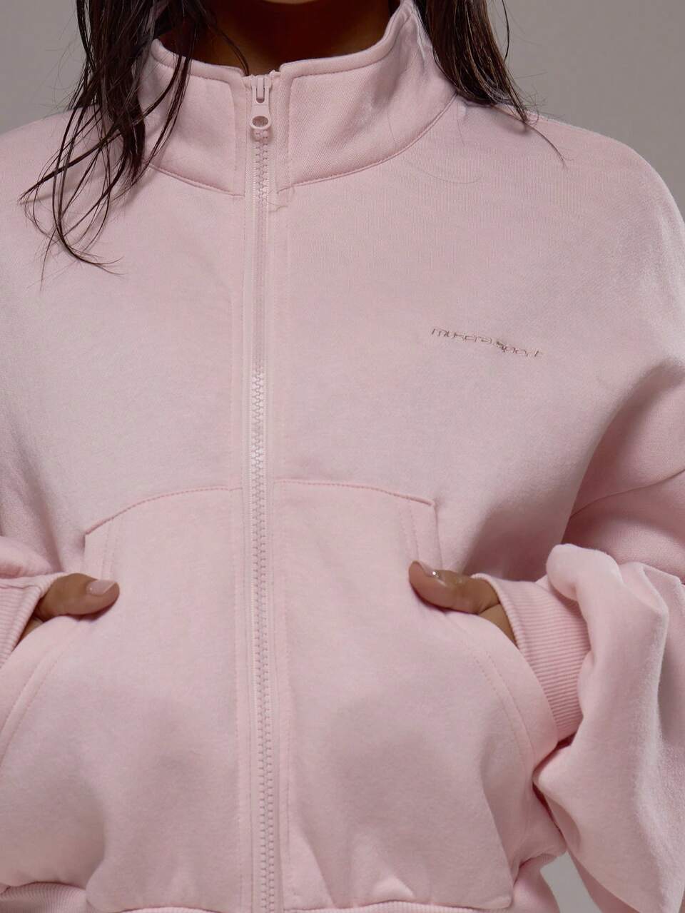 Rosa Fleece-Trainingsjacke mit Trichterhals und Reißverschluss