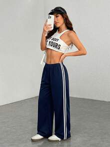 SHEIN EZwear 大码女式休闲藏蓝色侧条纹裤，简约时尚，适合日常休闲穿着、毕业季、返校季、毕业典礼、女教师着装等场合。宽松运动裤，阔腿运动裤，条纹运动裤，藏蓝色运动裤。 - 藏蓝色 - 查看 3
