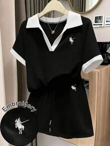 GlowEve 2 piezas Conjunto de top de manga corta y shorts de color contrastante para mujer - Blanco y Negro - Ver 1