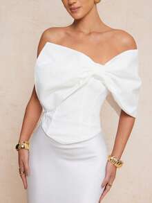 Lumalex Áo croptop nữ màu trắng không dây, ôm eo, thiết kế nơ lớn kiểu cổ điển, phong cách lãng mạn và thanh lịch cho mùa Xuân/Hè, thích hợp cho các bữa tiệc. Áo có phần thân trên mềm mại, phần eo kiểu corset, ôm sát cơ thể và tạo dáng thanh lịch nữ tính. Thích hợp cho mùa Xuân/Hè, phong cách lãng mạn thanh lịch. - trắng - Xem 14