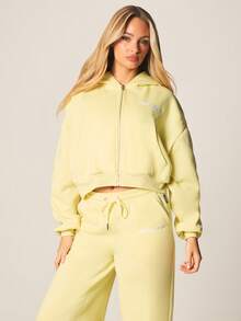 Missguided x Playboy 宽松短款拉链连帽卫衣，配有抽绳帽和中央口袋，适合秋冬季休闲穿着。 - 黃色 - 查看 4