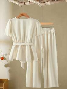Linhara Set da 2 pezzi composto da top a maniche corte e pantaloni color albicocca, stile casual e minimalista, con cintura, taglie comode - Albicocca - Visualizzare 2