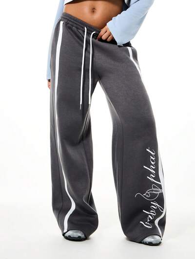 BABYPHAT Weite Bein Jogginghose mit Logo, Seitenstreifen-Detail und Kordelzug Taille für bequeme Freizeitmode
