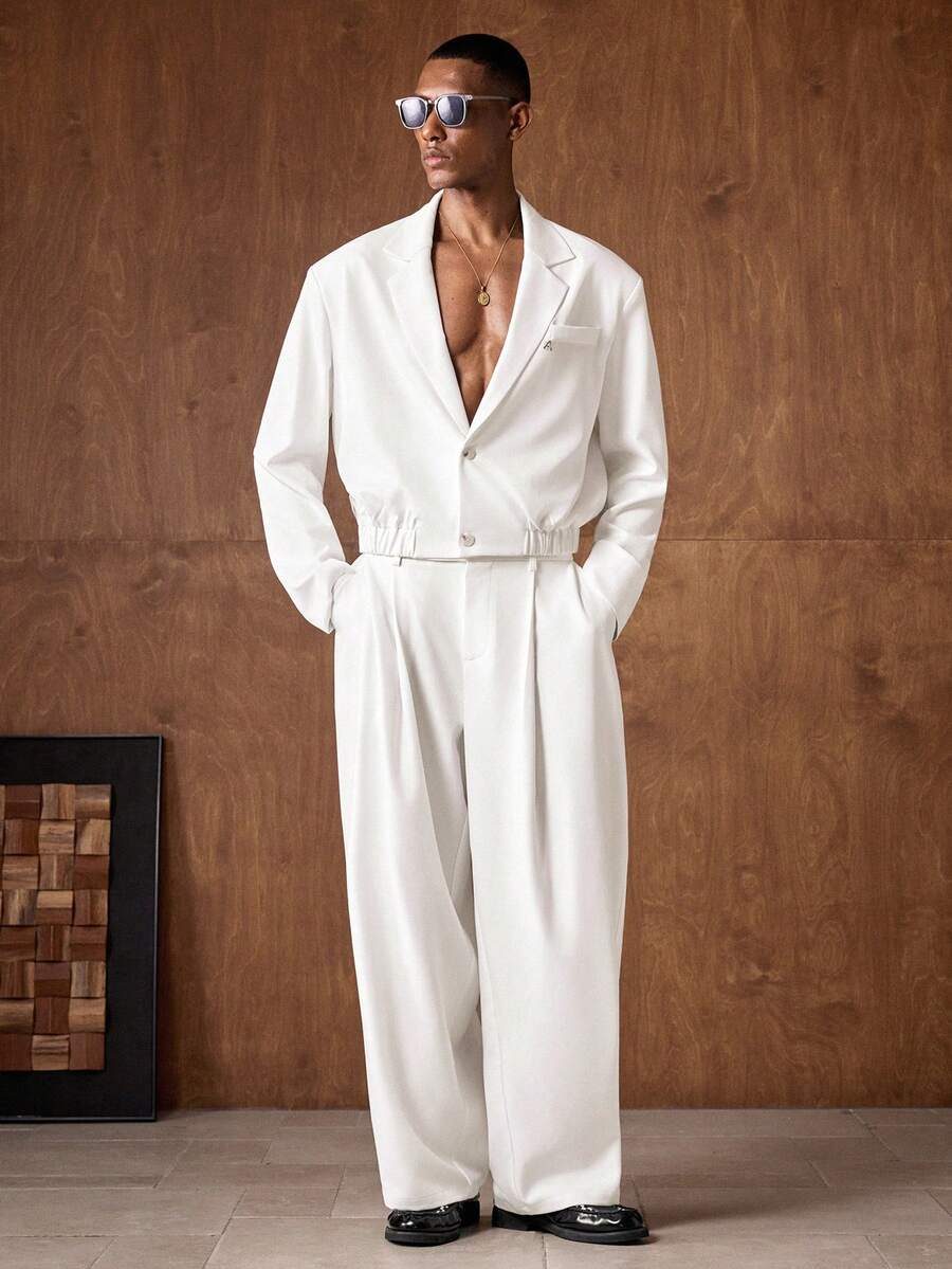 AKNOTIC Business Casual Bộ vest kaki 2 món dành cho nam, chất liệu vải dệt, dáng rộng, vai độn, ve áo, tay dài, gấu quần bo chun, phù hợp mặc hàng ngày và đi làm, kèm phụ kiện kim loại.