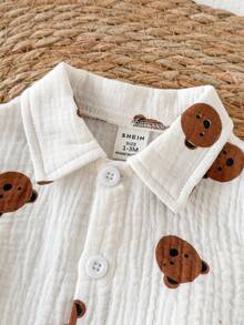 SHEIN Bộ 2 áo liền quần ngắn tay cổ tròn cho bé trai sơ sinh, họa tiết tre, sọc trơn, thêu hình gấu dễ thương, kiểu dáng retro, cài khuy, thích hợp cho các hoạt động ngoài trời hoặc công viên mùa hè. - trắng - Xem 5