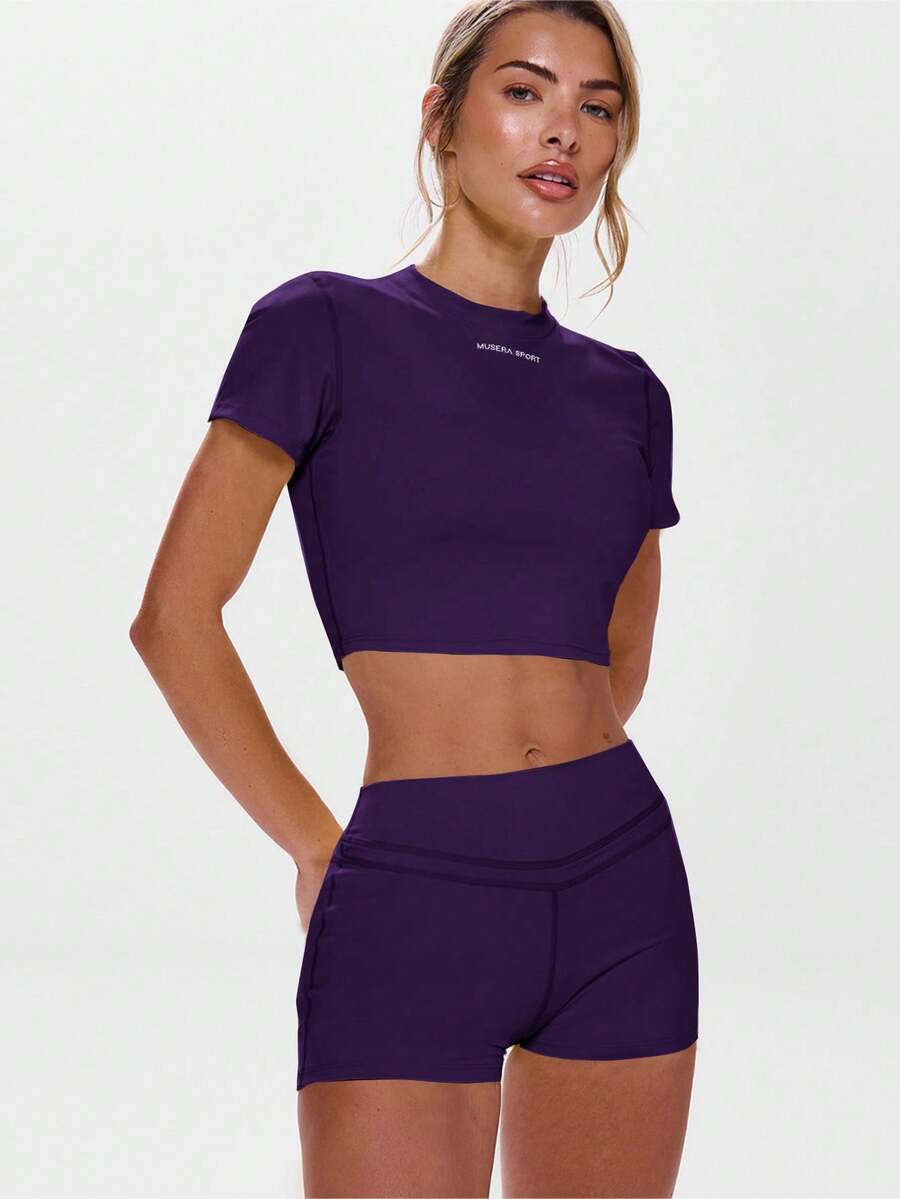Musera Sport 圆领短袖修身运动上衣,适合健身房、板式网球、网球、匹克球、瑜伽、普拉提等运动,日常休闲穿着。 - 紫羅蘭色 - 查看 1