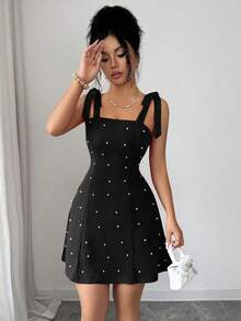Rafferiza Đầm ngắn dáng chữ A ôm sát, màu trơn, thanh lịch, độc đáo, trang trí nơ ngọc trai dành cho nữ. - màu đen - Xem 6