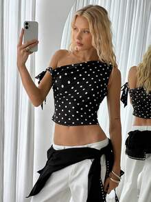 TRNVIE Blusa casual de mujer con hombros asimétricos, lunares negros, lazo y cintura elástica, ideal para vacaciones, casual, oficina o fiesta - Blanco y Negro - Ver 7