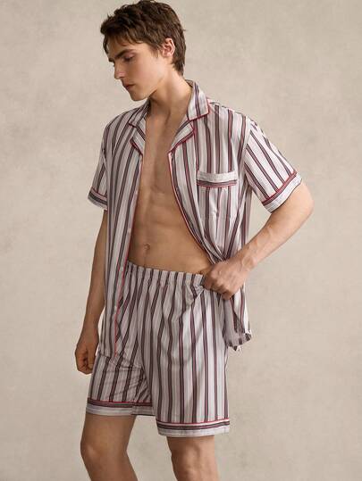 SHEIN Men's Pajama Set, Featuring Black And White Vertical Striped Pattern As The Core Element, Paired With A Basic Design Of Turndown Collar, Front Pocket, And Minimalist Decoration, Enhancing The Sense Of Simple Elegance. The Striped Pattern Avoids The Monotony Of Solid Color While Maintaining The Relaxed Feel Of Loungewear.