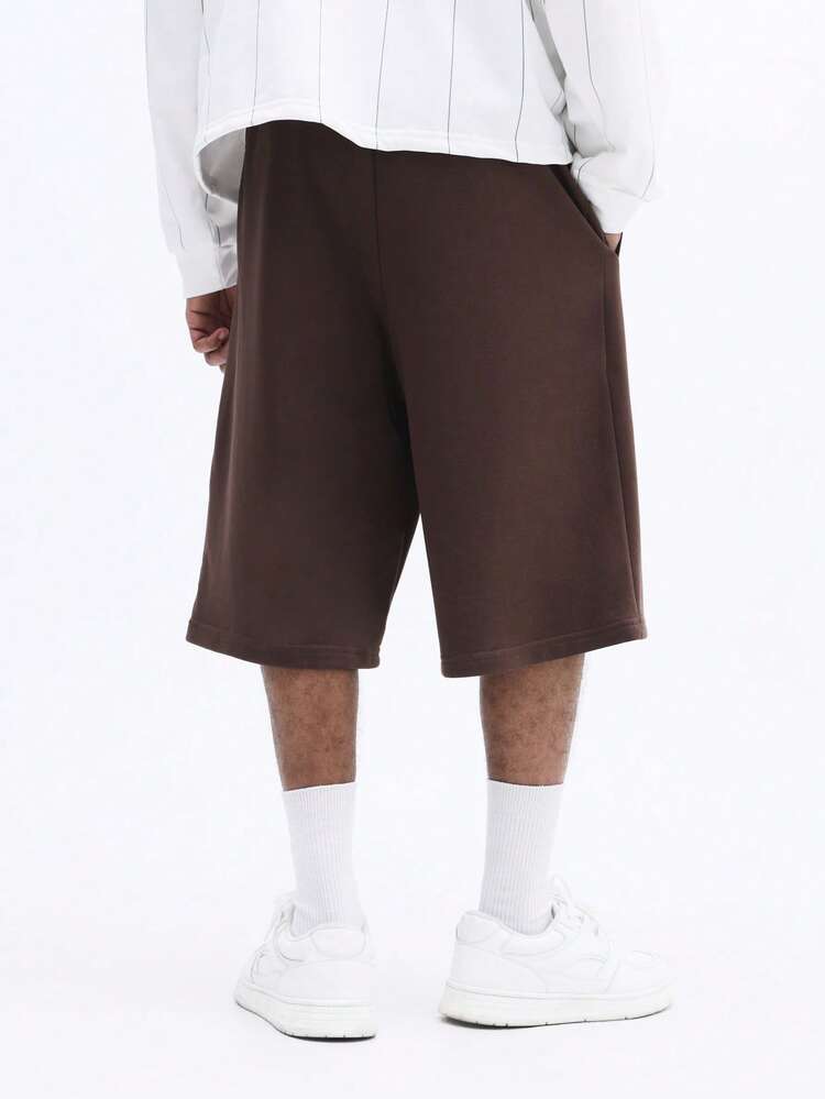 Shorts com estampa de escrita e cordão