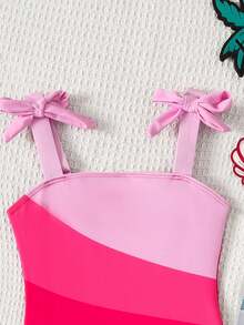 SHEIN Emery Rose Kids Bộ đồ bơi liền thân dễ thương cho bé gái, cổ áo bất đối xứng với nơ và viền bèo phối màu tương phản, màu tím, thích hợp cho du lịch biển mùa xuân/hè và kỳ nghỉ. - Nhiều màu - Xem 4