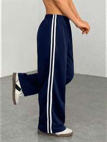 SHEIN EZwear 大码女式休闲藏蓝色侧条纹裤，简约时尚，适合日常休闲穿着、毕业季、返校季、毕业典礼、女教师着装等场合。宽松运动裤，阔腿运动裤，条纹运动裤，藏蓝色运动裤。 - 藏蓝色 - 查看 4