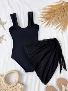 SHEIN 少女连体泳衣，采用纹理面料和网纱裙摆设计，适合海滩、泳池、休闲度假等场合。春夏黑色连体泳衣，可爱黑色泳装，适合青少年女孩。黑色泳衣，女士泳装，少女连体黑色泳衣，青少年泳装，黑色泳衣，儿童泳装套装，少女黑色泳衣，黑色系带纱笼裙，儿童黑色连体泳衣，女士泳装，海星图案泳衣，沙滩装，黑色泳衣罩衫。 - 黑色 - 查看 2