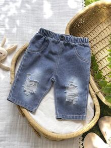 SHEIN Vintaside Kids 乡村风新生儿牛仔裤，经典水洗蓝+假口袋+全弹力腰带，方便穿脱+腰带处复古纽扣装饰，宽松舒适，时尚可爱，适合日常外出、旅行和休闲穿着。 - 藍色 - 查看 4