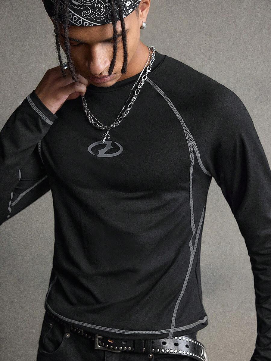 AXEPEAK Camiseta de manga larga con estampado gráfico simple y mangas raglán de color contrastante para hombre - Negro - Ver 1