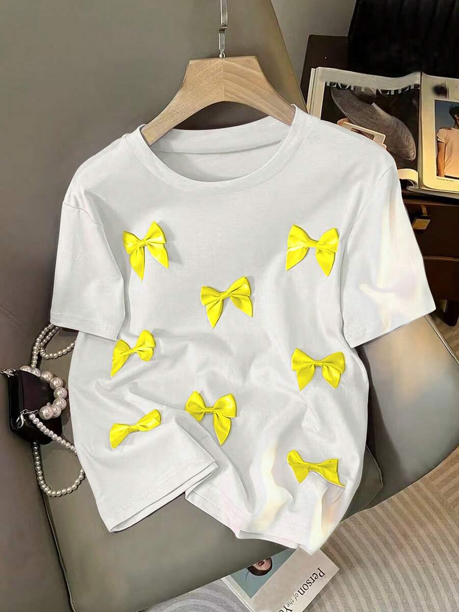 Resyla 女士休闲H型圆领3D蝴蝶结短袖粉色T恤，夏季可爱女式衬衫，可爱T恤，可爱短袖上衣，露脐上衣，卡哇伊衬衫，黄色夏季上衣，黄色奶油色上衣，Zahide T恤，黄色上衣，女士优雅黄色套装，女士夏季上衣，Y2K服装，Y2K衬衫，女式上衣 - 白色 - 查看 1