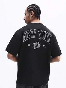 SUMWON Oversized Crew Neck Kurzarm T-Shirt mit New York Aufdruck und 1994 Grafik für lässigen Streetwear Stil - Schwarz - Übersicht 1