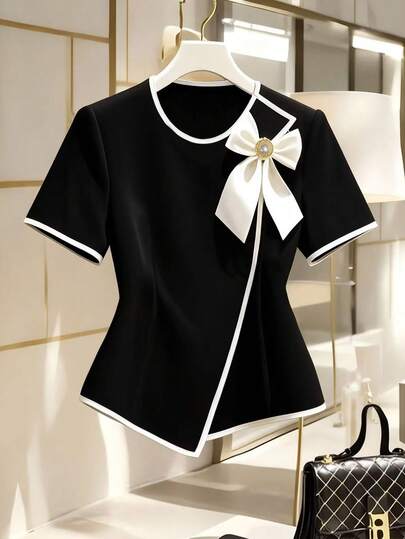 Franclia Blusa elegante de manga corta con decoración de lazo para mujer de talla grande