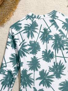 SHEIN 1件装少女随机印花连体泳衣。新款夏季女童泳装。黑色纯色拼接度假风，采用黑、白、棕榈树图案面料，贴身设计凸显身材，风格独特。黑白极简都市风，适合女孩度假、海滩、游泳、水上乐园等场合穿着。长袖拉链设计，方便穿脱，更好地保护皮肤。适合冲浪。 - 彩色 - 查看 4