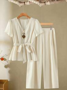 Linhara Set da 2 pezzi composto da top a maniche corte e pantaloni color albicocca, stile casual e minimalista, con cintura, taglie comode - Albicocca - Visualizzare 1