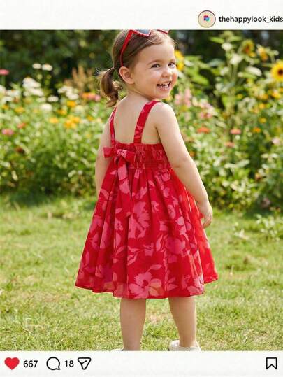 THE HAPPY LOOK Vestido sin mangas con cintura ceñida, decorado con lazo y estampado floral para niña