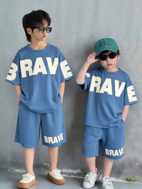 SHEIN 2pcs Kids Boy Casual Comfortable Big Letter Print Round Neck Loose Short Sleeve Blue T-Shirt And Blue Shorts Tracksuit Set, Suitable For Spring/Summer, Outings, Valentine's Day, Dates, Travel, Vacations, Family Gatherings, Back To School, Weddings, Evenings, Sports, Birthday Parties